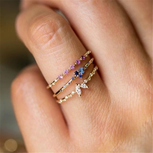 Three-piece stackable S925 silver rings with colorful gemstones in gold finish