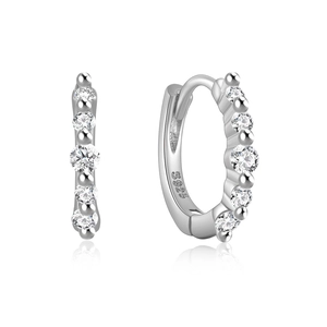 Macro shot of S925 sterling silver hoop earrings featuring five graduated cubic zirconia