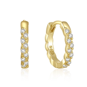 Macro detail of S925 sterling silver stamp on gold-plated pave hoop earrings