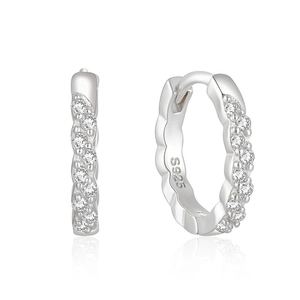 Macro detail of S925 sterling silver hoop earrings with wavy texture and zircon inlay