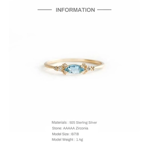 Macro detail of S925 sterling silver ring with marquise-cut light blue AAAAA zirconia stone