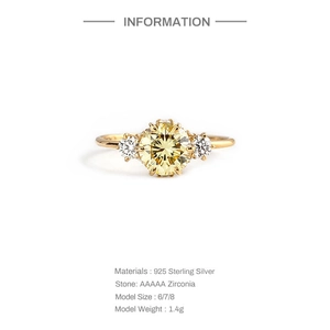 Makroaufnahme S925 Sterlingsilber Ring mit gelbem Zirkonia und weißen Steinen