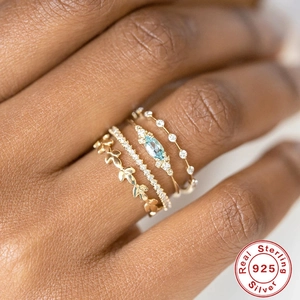 Luxury 925 sterling silver four-piece stackable ring set with marquise blue sapphire