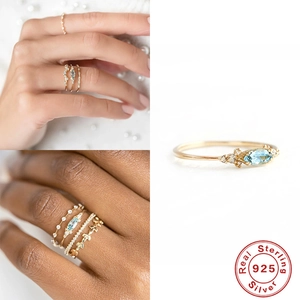 S925 sterling silver ring with marquise cut blue sapphire and diamond accents
