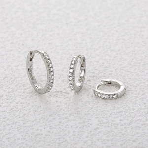 Detailed view of S925 sterling silver hoop earrings set with micro-paved cubic zirconia