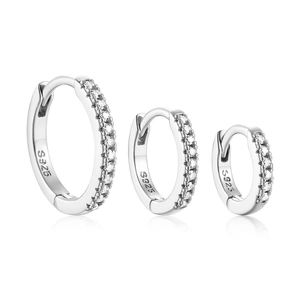 Detailed macro view of S925 sterling silver hoop earrings in three various sizes