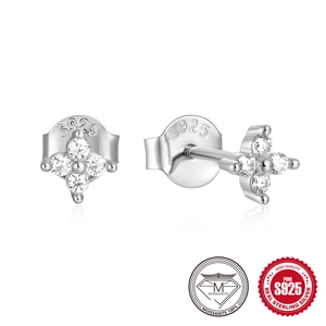 S925 sterling silver flower stud earrings with four-prong moissanite stones on white background