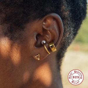 S925 sterling silver gold ear cuff and chain stud set worn on model ear