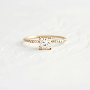 Detailed view of an S925 silver ring featuring a square-cut diamond and pavé accents
