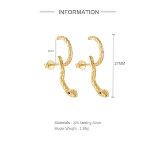 Detail of 925 sterling silver gold snake earrings with scale texture and S925 hallmark