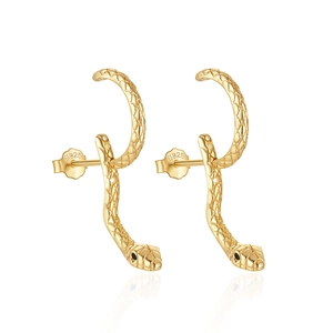 Detailed macro view of S925 sterling silver gold snake studs with fine scale textures