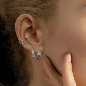 Three-piece S925 sterling silver ear cuff set featuring starry crystals and textured hoops
