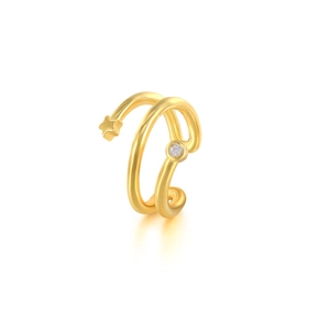 Detailed view of an 18K gold star ear cuff featuring a sparkling cubic zirconia stone