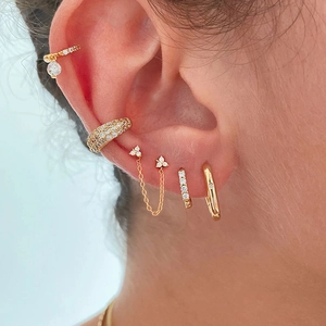 S925 silver gold-plated C-shaped ear cuffs set with sparkling zircons on model