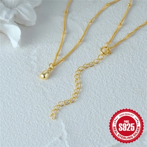 Minimalistische S925 Silber Goldperlenkette mit glattem Wassertropfenanhänger für Damen