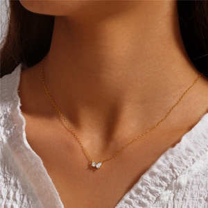 Detail of minimalist S925 silver necklace featuring sparkling cluster zircon stones on skin