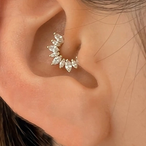 Detailed shot of S925 silver marquise-cut crystal fan cluster daith piercing ring