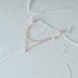 Detailopname van S925 sterling zilveren dubbele oorknopjes met kwastjes en zirkonia