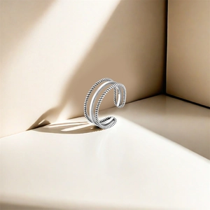 Macro shot of S925 sterling silver stamp on the layered woven texture open toe ring