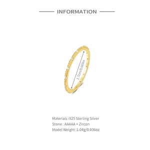 Macro detail of S925 sterling silver stamp and zircon setting on gold plated ring