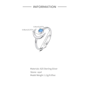 Detailed spec view of S925 silver ring featuring moon design and blue opal gemstone