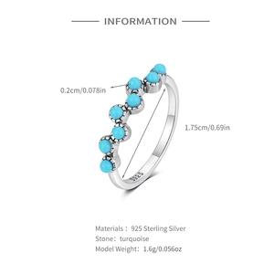Macro detail of S925 sterling silver ring featuring seven round turquoise stones