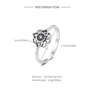 Macro view of S925 sterling silver lotus ring featuring vintage oxidized flower petals