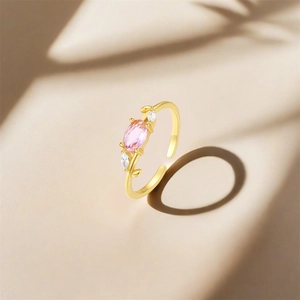 Close-up of S925 sterling silver ring with pink gemstone and leaf design