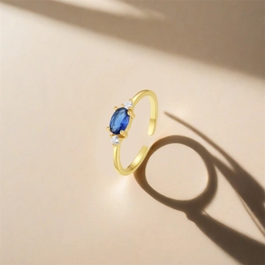 Detail shot of S925 sterling silver ring with blue oval stone and S925 hallmark engraving