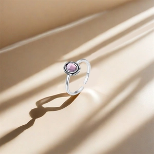 Macro shot of S925 sterling silver ring showing the inner S925 hallmark and opal stone