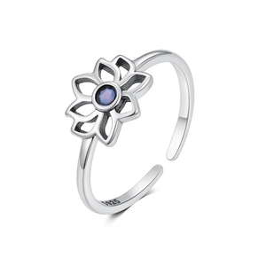 Macro detail of the S925 sterling silver hallmark and intricate floral ring design