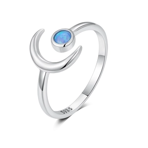Detail of S925 silver ring featuring a blue opal stone set in a polished crescent moon