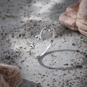 Macro shot of S925 sterling silver ring showing the inner S925 hallmark and vine detail