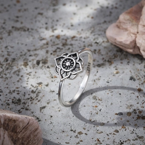 Close-up of S925 sterling silver stamp on vintage mandala flower ring inner band
