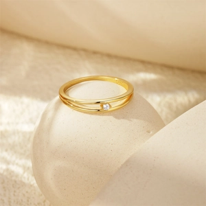 Detailed close-up showing the S925 silver hallmark on a gold double-layer diamond ring