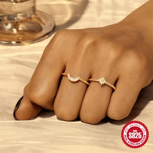 Elegant gold S925 sterling silver moon and star ring set with shimmering cubic zirconia