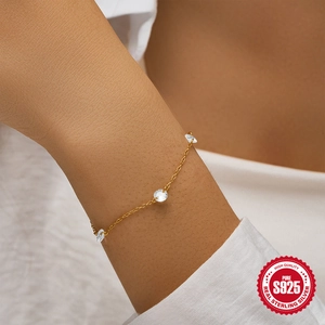 Minimalist S925 sterling silver gold-plated bracelet featuring three sparkling zircons