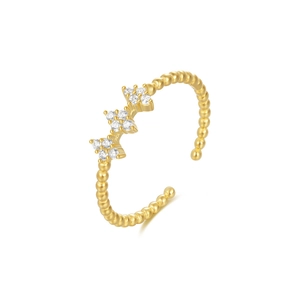 Macro detail of S925 silver beaded cuff ring with three sparkling floral zircon settings