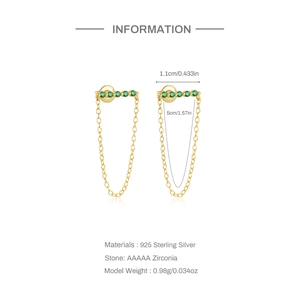 Macro detail of S925 sterling silver long tassel earrings with green zircon stones