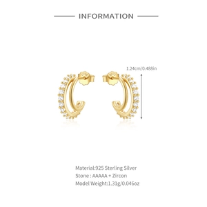 Detail view of 925 silver C-shape double hoop earrings with cubic zirconia pavé setting