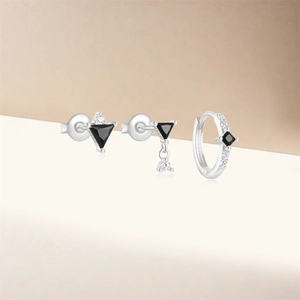 Detailed view of S925 silver earring set featuring black geometric gems and diamond accents