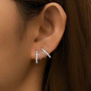 Detail of S925 sterling silver multi-layer ear cuff with shimmering pavé zircon stones
