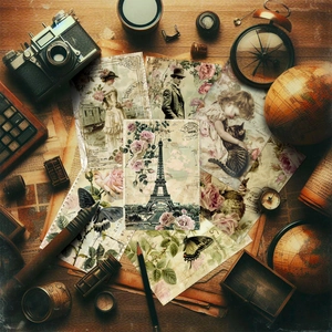 Flat lay of vintage scrapbooking paper with Victorian motifs and classic floral designs