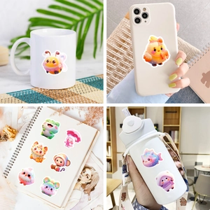 Autocollants d'animaux mignons décorant une tasse, un téléphone, un cahier et une gourde