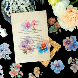 Detailed view of floral PET stickers with gold foil accents for scrapbooking and DIY craft