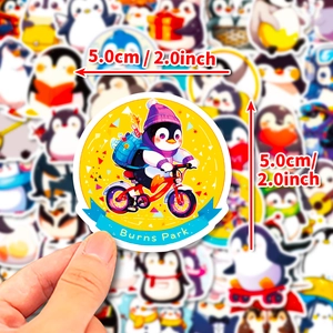 Cute cartoon penguin sticker 5cm size showing a cycling penguin design on stickers stack
