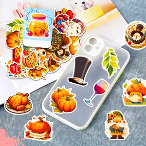 Waterproof Thanksgiving stickers showing pumpkins and turkeys on a clear phone case