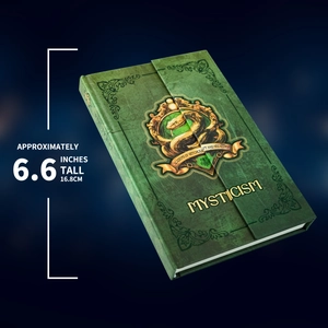 Close-up of vintage green python pattern notebook with gold mystic wizardry crest