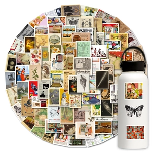 Close-up of vintage art stickers applied on a white bottle with retro aesthetic design
