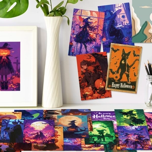Close-up of Halloween aesthetic decorative cards featuring witches and pumpkins on a wall